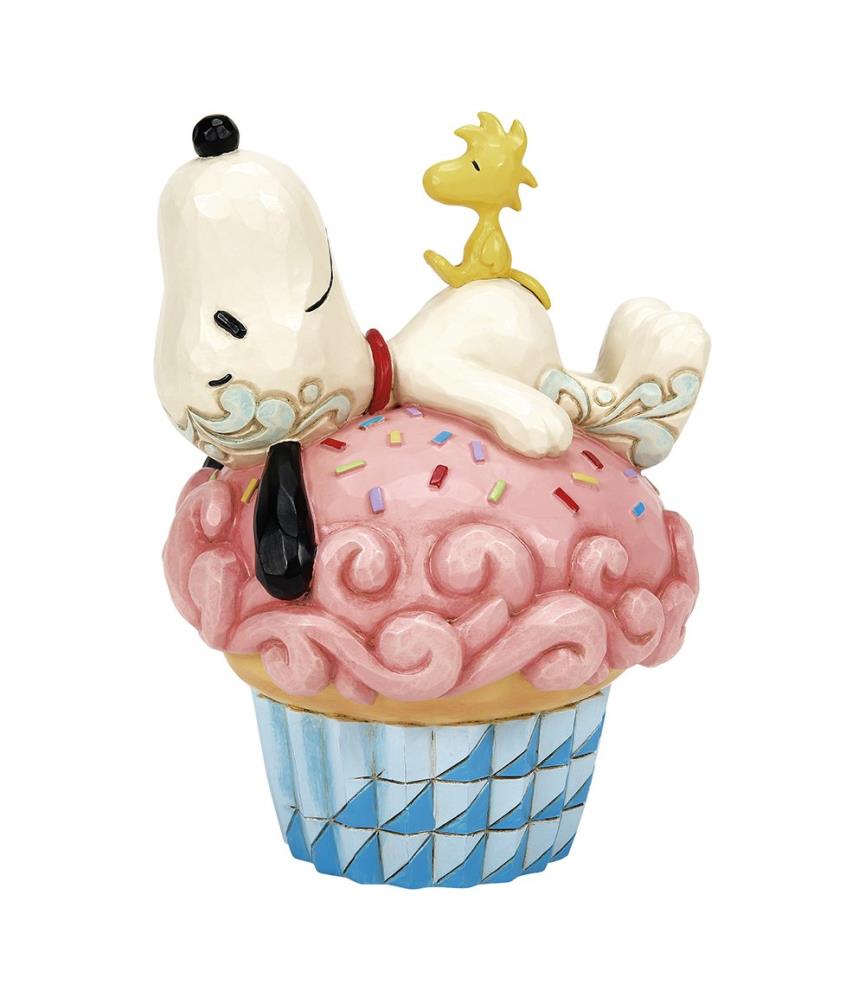 Sprinkle Snooze: noopy Laying on Cupcake