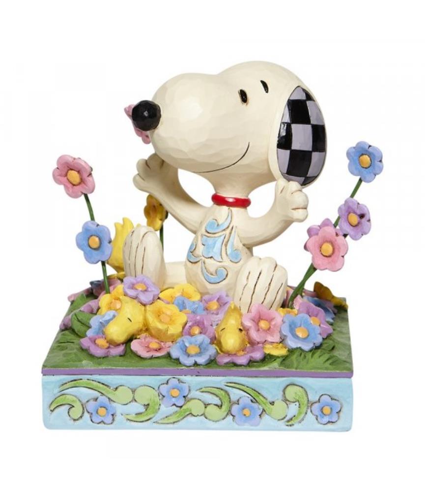 Snoopy in bed of Flowers Figurine