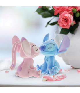 Flocked Kissing Stitch and Angel Figurines